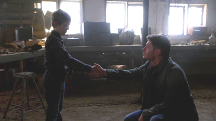 Dean teaches Timmy a more grown-up handshake.